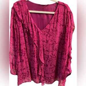 Like new- Beautifully feminine long sleeved blouse. Dressy and sexy